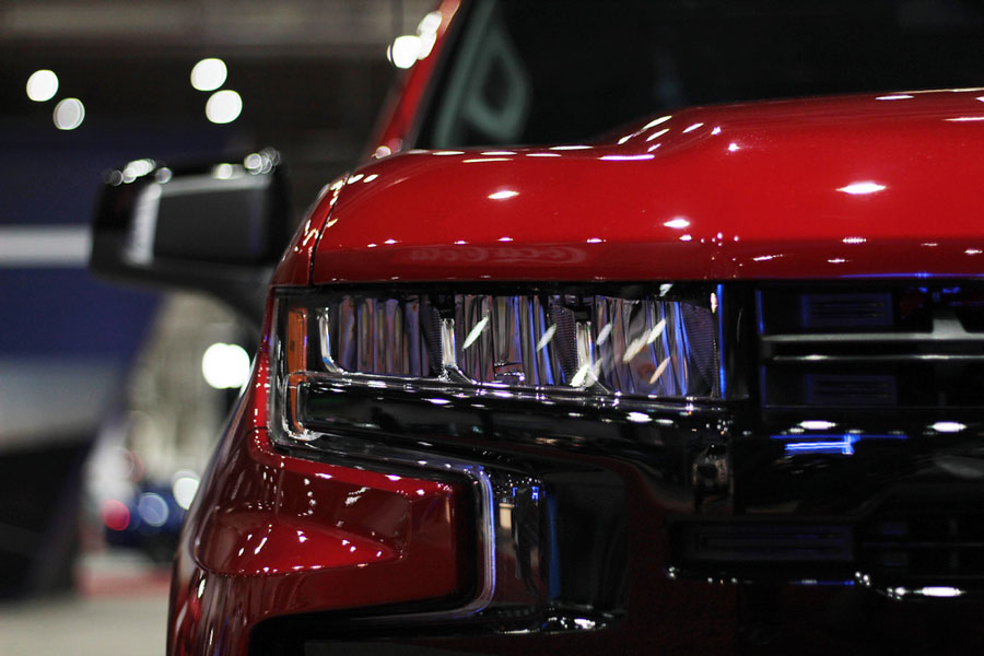 A red Chevy Silverado on a display